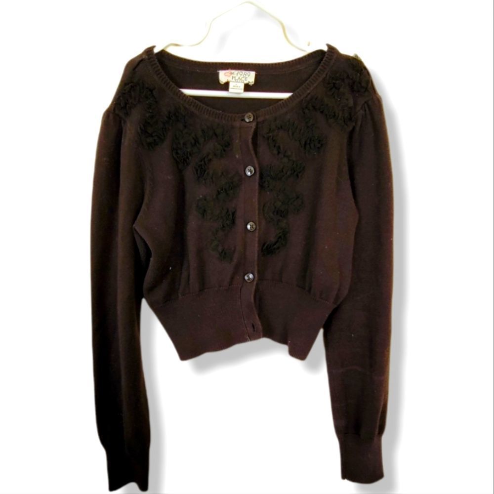 Black button up sweater with floral detail